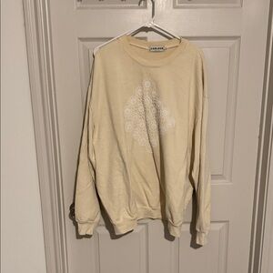Carleen Cream Crewneck Sweatshirt with Lace-Inspired Graphic